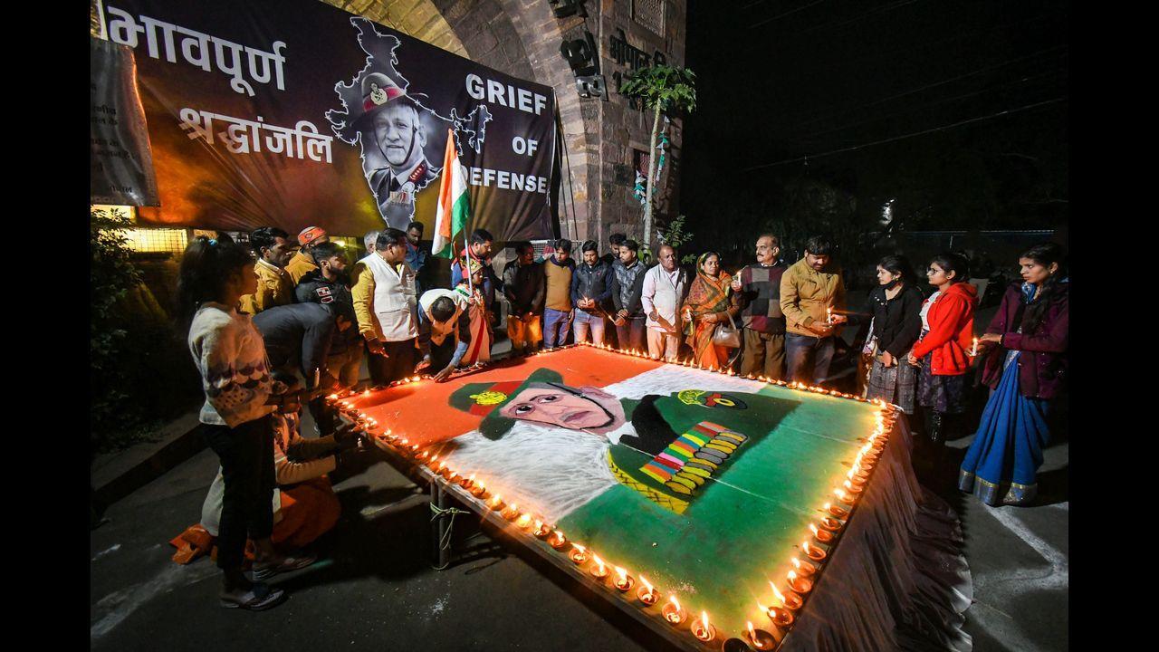 People pay homage to Chief of Defense Staff (CDS) General Bipin Rawat and his wife Madhulika Rawat and other staff and officials were killed in chopper crash. Pic/PTI